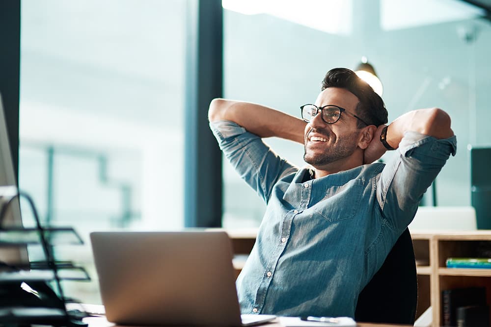 Relaxed business owner at their desk